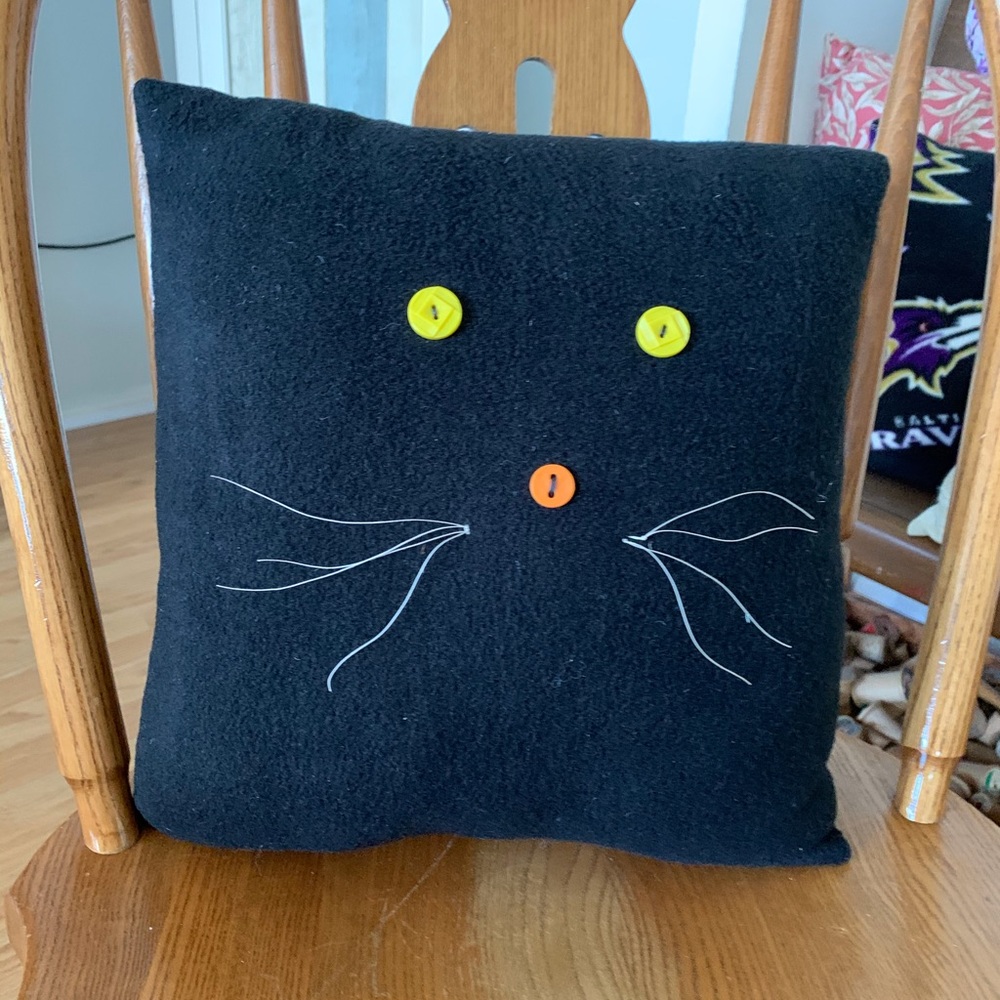Black cat fleece throw pillow